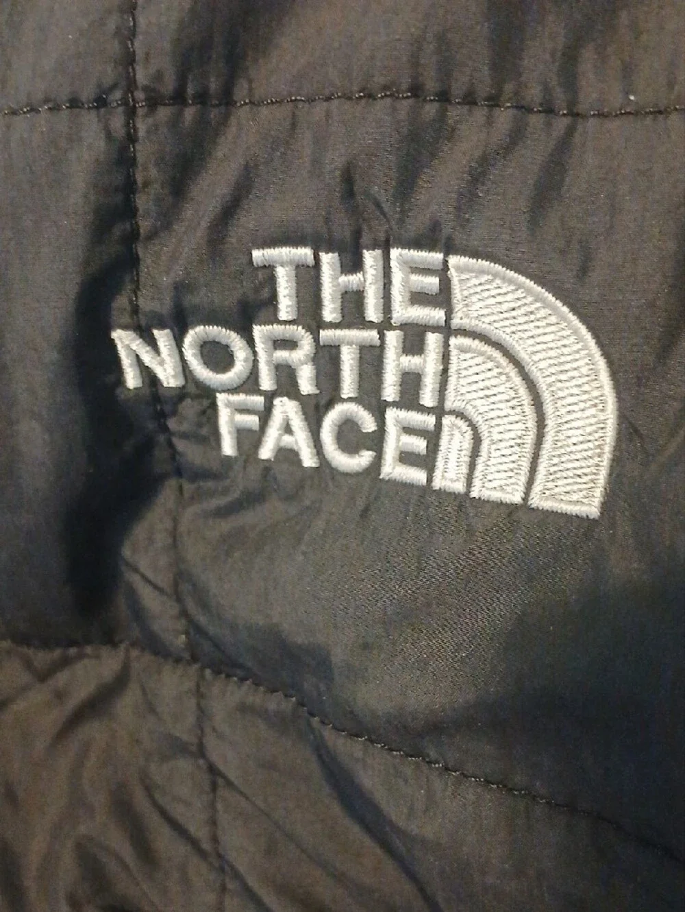 The North Face Men's Black Quilted Puffer Jacket in Size S